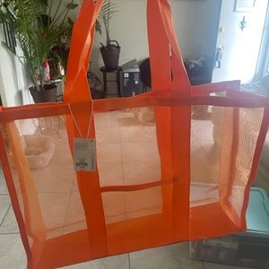 Poshmark orange one size orange mesh bag.